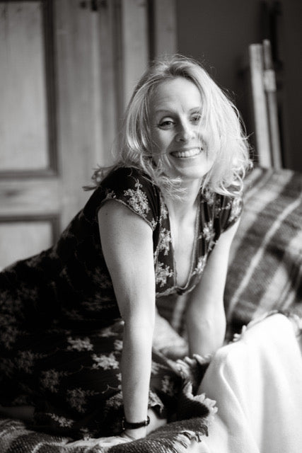 lady by a bed