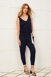 navy-ribbon-tie-jumpsuit-cucumber-clothing